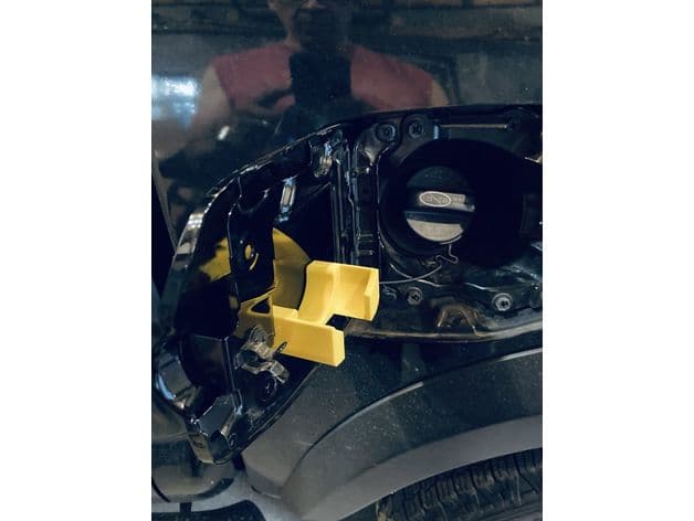 Fuel-Cap Door Holder