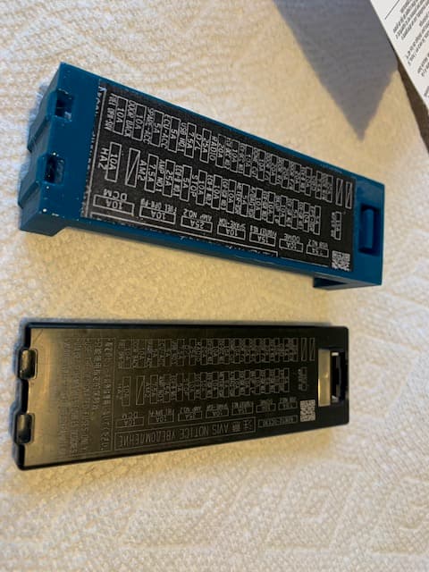 Raised Passenger Fuse-Box Cover