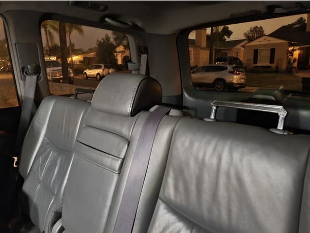 Rear-Seat Headrest Storage Bar